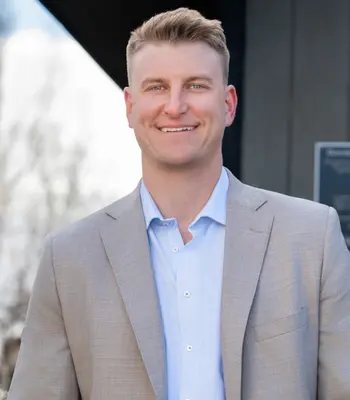 Portrait of John Sintich, Realtor.